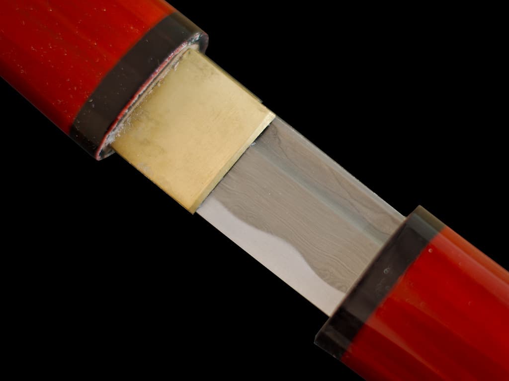 Kaji, shirasaya feu (火事), forge damassée : détail de la lame forgée damas